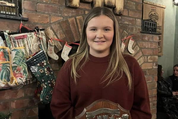 Amber Henderson with her award at Donaghadee YFC's recent annual Christmas awards dinner at Saints N’ Sinners in the seaside town.