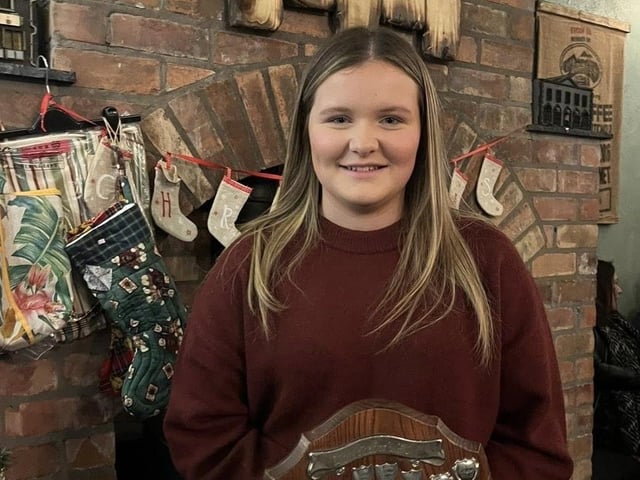 Amber Henderson with her award at Donaghadee YFC's recent annual Christmas awards dinner at Saints N’ Sinners in the seaside town.