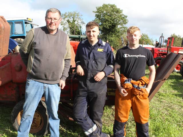 Supporting the threshing day, from Left, Karl Buckley, Robert Lester and Cody Matthews.