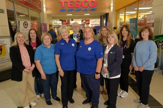 Charity representatives Pamela Keery (Belfast Drug and Alcohol Coordination Team (BDACT)), Alyson Dollin (Regional Officer at Arthritis UK), Emily Wilson (Alzheimer’s Society), Caroline Edmondson (Community Champion at Tesco Bangor), Alan Kinghan (North Belfast Men's Shed), Donna McCotter (Community Champion at Tesco Yorkgate), Lauren Shanks (Mencap NI), Paula Kennedy (Breast Imaging BHSCT), Sarah Jewell (N. Ireland Hospice) and Moira McCallan (Cancer Lifeline).