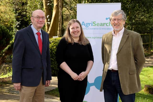 Norman McMordie (Vice Chair AgriSearch) congratulating Dr Gillian Young (AFBI) and Prof. Trevor Gilliland (Queen's University) on being awarded an AgriSearch PhD Scholarship