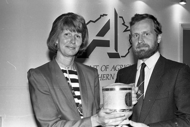 Mrs Lindsay Brooke, the wife of Northern Ireland Secretary of State Sir Peter Brooke, presents the Duke of Cornwall award for forestry and conservation to John Witchell of Clandeboye Estate, Co Down, at the Balmoral Show in 1991. Picture: News Letter/Farming Life archives|