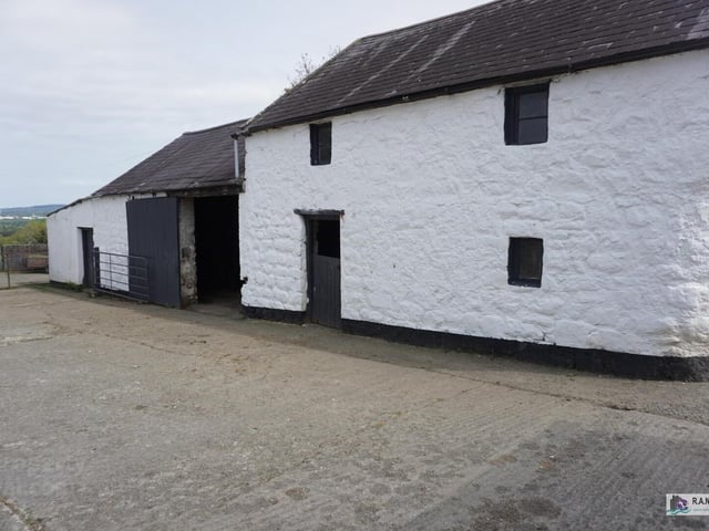 The farm comprises a beautiful detached traditional four-bedroom farmhouse, which is exquisitely poised within a traditional courtyard comprising stone outbuildings and stables.