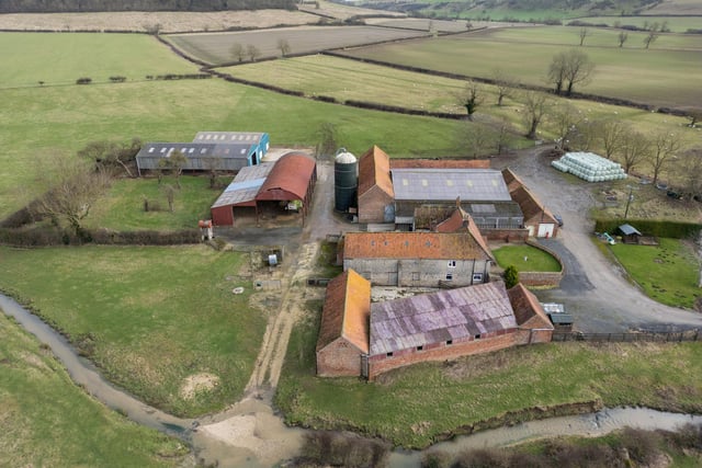 The well-equipped livestock farm boasts a range of traditional and modern farm buildings and productive grassland