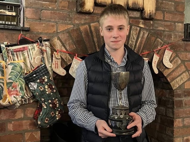 Rory Strain with his award at Donaghadee YFC's recent annual Christmas awards dinner at Saints N’ Sinners in the seaside town.