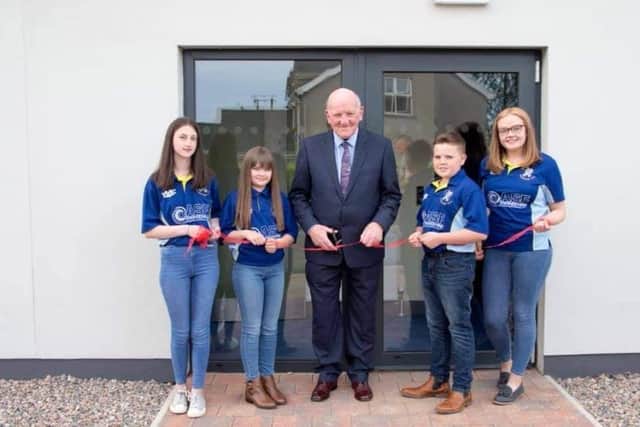 Glarryford YFC's patron Ernest O'Hara opening the new Glarryford Farmers' Hall in 2019 with senior and junior club members. Picture: Glarryford YFC