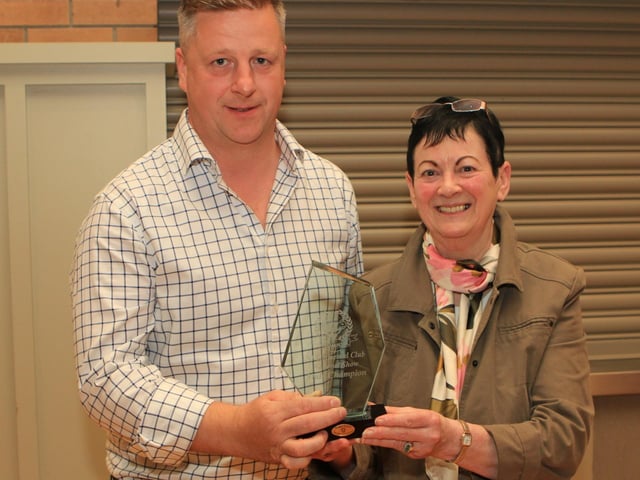 Ruth Montgomery, Clogher Valley Show secretary, presenting the male champion crystal Neil McIlwaine for Corrick Spartan
