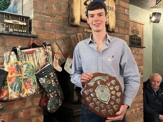 Andrew Molyneaux with his award at Donaghadee YFC's recent annual Christmas awards dinner at Saints N’ Sinners in the seaside town.