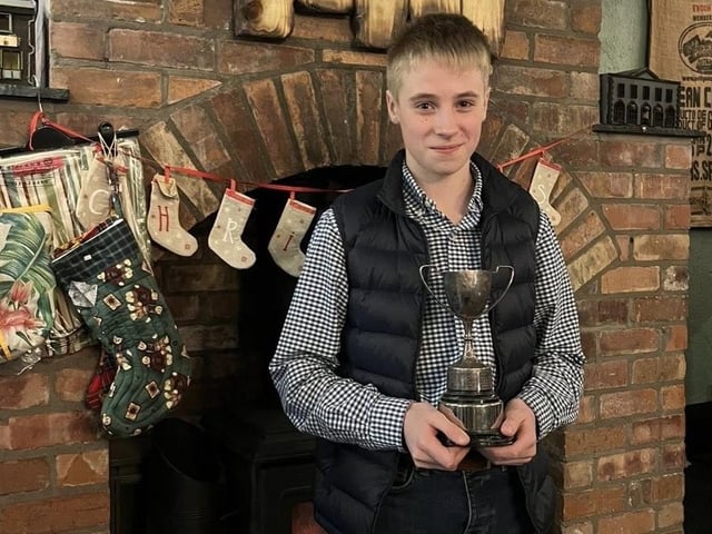 Rory Strain with his award at Donaghadee YFC's recent annual Christmas awards dinner at Saints N’ Sinners in the seaside town.