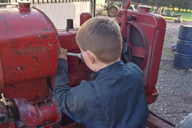 Nine-year-old Buddy Antcliff has well and truly been bitten by the vintage tractor bug. Pic: Rachel Antcliff