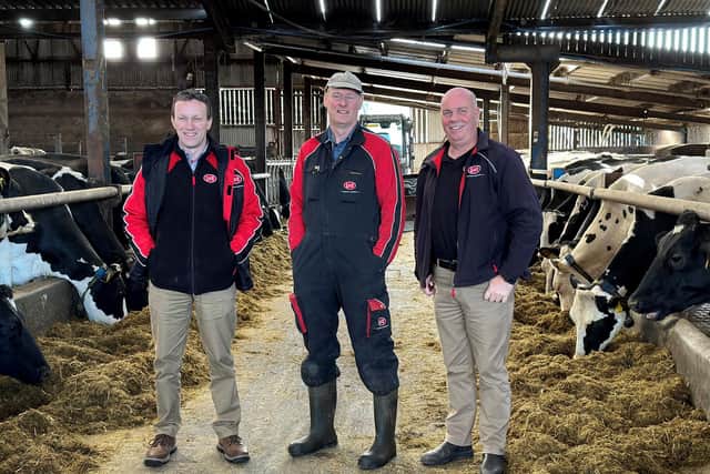 Tommy Armstrong, Sales Executive, and Maurice Wylie, Customer Care, speaking with Stephen Hamilton about the upcoming Lely Open Day on his farm in Collone Co. Armagh.