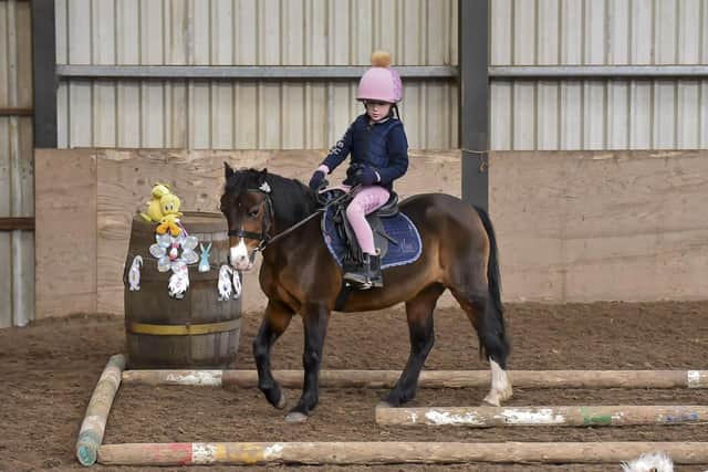 Maisie Wallace and Lily step into third place in the obstacle course. (Pic: Equi-Tog)