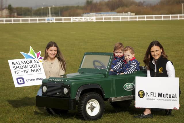 Holly Gillan, Glenarm Castle and Leah Crozier, NFU Mutual accompany Henry and Hugh Patterson in one of the experience’s mini Land Rovers. Pic: Brian Thompson