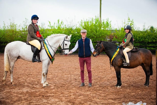 Pony Champion, Poppy Mcllduff and Napoleon, and Reserve, Ella Dickson and Harvey pictured with judge Brian Murphy. (Pic: Black Horse Photography)