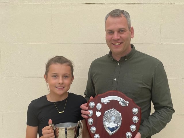 Lucy Hazelton pictured with chairman Shane Mcdonald winner of the Young Stockperson of the Year 2026 Shield and Thelma Gorman cup.
