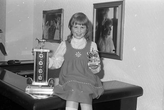 Pictured in October 1982 at the Mounthill Fair Society dinner and prize distribution at Kilwaughter is Ena Heasley from Killinchy, Co Down, with the beautiful McKee Trophy which she won in the first ridden pony class at the Mounthill Fair. Picture: Farming Life/News Letter archives