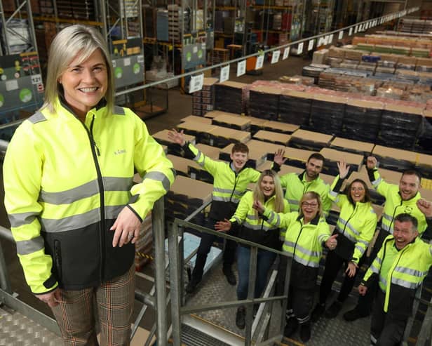 Maeve McCleane, Chief People Officer at Lidl Ireland & Northern Ireland, with the team from Lidl Northern Ireland’s Regional Distribution Centre.