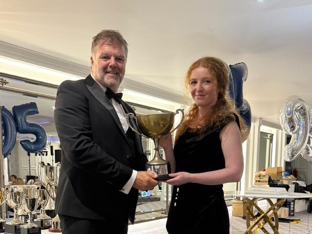 Sophie Smyth receiving the award for best senior female.