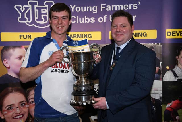 Jack Johnston, Randalstown YFC, who won overall winner of Ulster Young Farmer 2023 with YFCU president, Stuart Mills