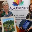 Mayor Patricia Logue makes a presentation to Linda Ming, third place in the Age Friendly "Your Happy Place" competition. Photo - Tom Heaney, nwpresspics)