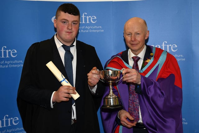 John Mawhinney (Draperstown) received the NIAPA Cup presented for performance in animal husbandry on the Level 2 Advanced Technical Certificate in Agriculture at the Greenmount Campus Graduation Ceremony presented by Dr Eric Long (Head of Education, CAFRE)