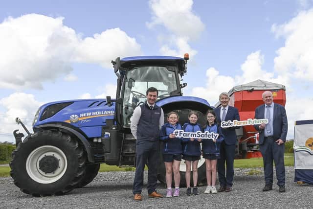 Agri Aware executive director Marcus O'Halloran alongside students of Moycarkey National School with local Independent TD Michael Lowry and Fianna Fáil TD Jackie Cahill at the Safe Farm Futures farm safety workshop held in Moycarkey National School last Friday, April 26th