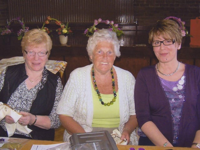 We were wondering if any of our readers might be able to identify those in the photographs.