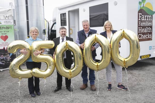 Christine Faulkner (Farm Families Regional Co-ordinator), Health Minister Robin Swann MLA, 10,000th Farm Families client James Reilly, and Laura Taylor (Health Improvement Senior Officer from the Public Health Agency) at the Balmoral Show. (Pic: Freelance)