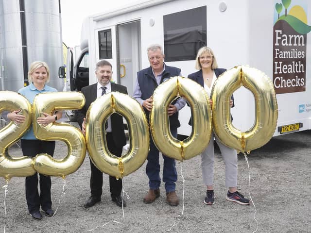 Christine Faulkner (Farm Families Regional Co-ordinator), Health Minister Robin Swann MLA, 10,000th Farm Families client James Reilly, and Laura Taylor (Health Improvement Senior Officer from the Public Health Agency) at the Balmoral Show. (Pic: Freelance)