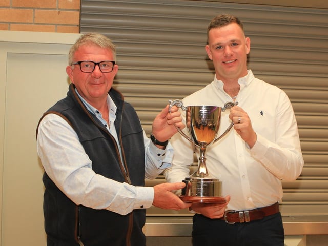 Trevor Wylie presenting the S.H. Watterson Perpetual cup for the highest priced bull winner to Ryan Gilmour for GILLVIEW RANGER