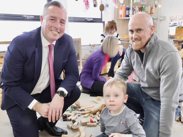 Pictured at Sure Start in Belleek are Education Minister Paul Givan with parent Niall Ward and his son Conor.
