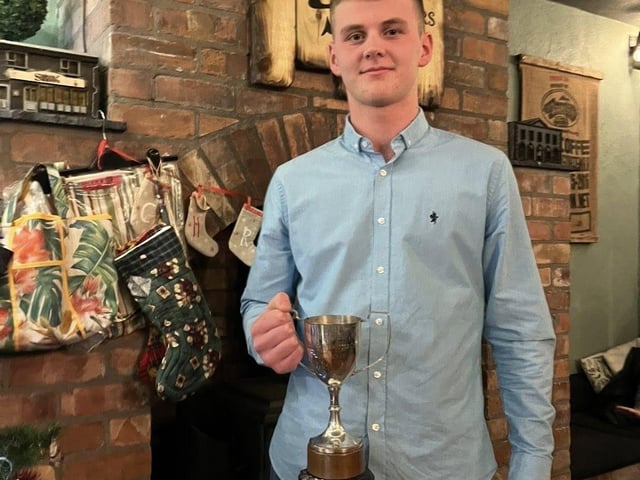 David Hamilton with his award at Donaghadee YFC's recent annual Christmas awards dinner at Saints N’ Sinners in the seaside town.