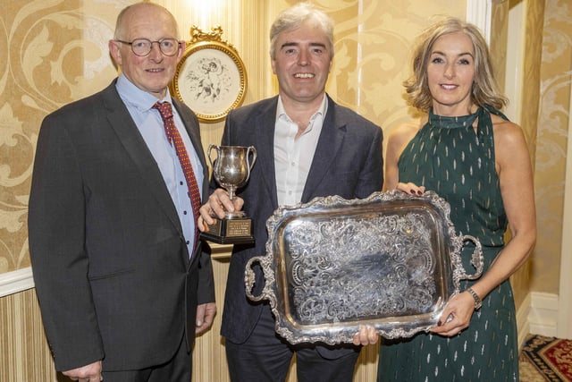Holstein UK chairman. Michael Smale congratulates Stuart and Monica Smith, Prehen Herd, Londonderry, on winning a number of awards. Picture: Kevin McAuley/McAuley Multimedia