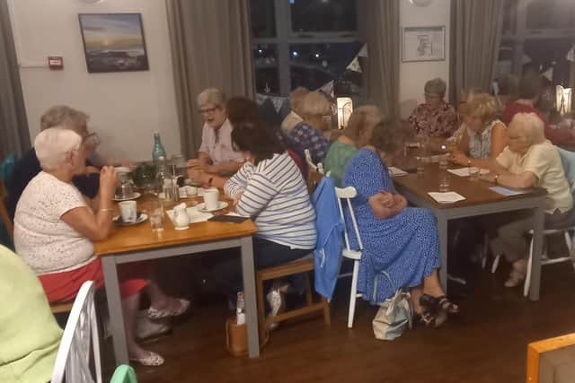 Members enjoying a chat after the meal. Pic: Portaferry WI