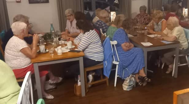 Members enjoying a chat after the meal. Pic: Portaferry WI