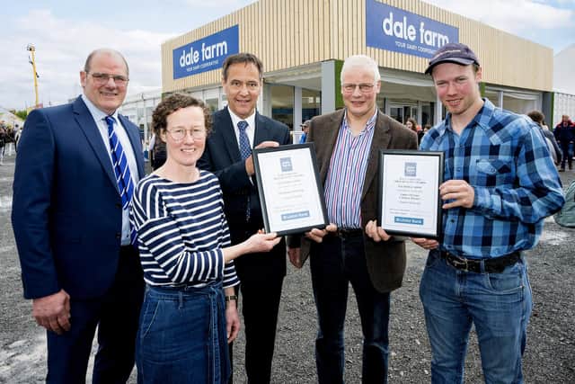 Fred Allen, Dale Farm Chair and Cormac McKervey, Head of Agriculture, Ulster Bank pictured with Samuel Kennedy and family