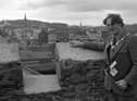 Taking in the view from the top of the Tower House tower in Quay Street, Bangor, in October 1982, is the Mayor of Bangor, Councillor J McConnell Auld, who officially re-opened the building after it had been renovated. It was to be used (and still is) as a tourist information centre. Picture: News Letter archives