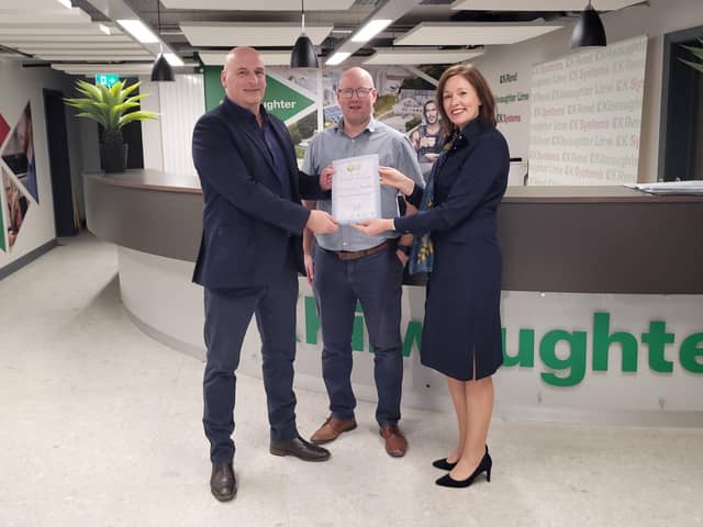 UFU deputy president John McLenaghan welcoming Jonny Rice, agri product manager and Caroline Rowley, business development director as its newest corporate member.