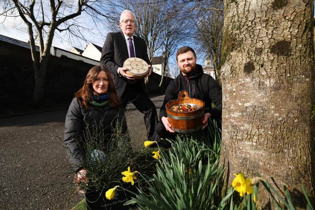 Lisburn & Castlereagh City Council announce the return of Royal Hillsborough Farmers’ Market. The market will take place along The Dark Walk at Hillsborough Fort from 10am to 3pm on Saturday 25th March. Market goers can expect no less than 50 traders lining The Dark Walk, offering a diverse range of artisan food and drink, street food, speciality coffees, art, crafts and organic skincare. Pictured at the launch of the Royal Hillsborough Farmers’ Market are, (left to right): Victoria Allen, Potters Hill Plants; Alderman Allan Ewart MBE, Development Committee Chairman and Fergal Green, Tom and Ollie