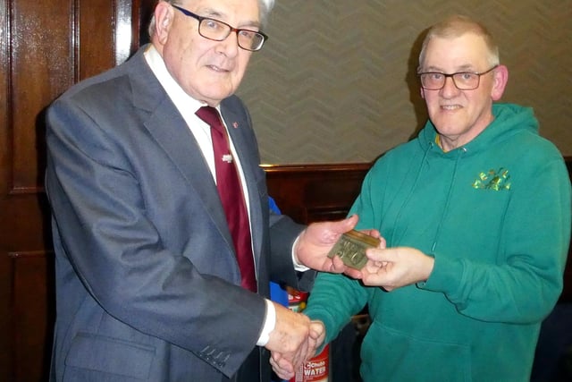 Charles Friel BEM receives a plaque from David Heatley. Picture: Alan Hall