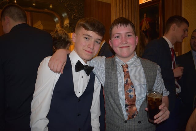 Oliver Taggart and Riley Hoy celebrate at the Holestone YFC 80th anniversary dinner at the Galgorm Resort. Picture: Holestone YFC
