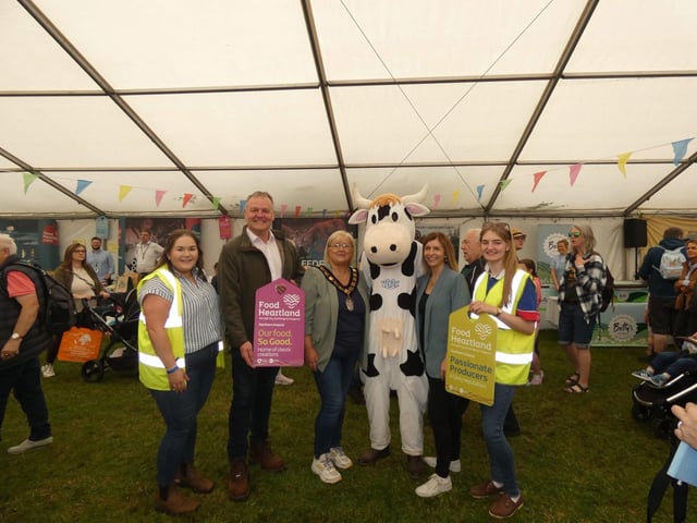 Moo along with Collone YFC members visiting the food village