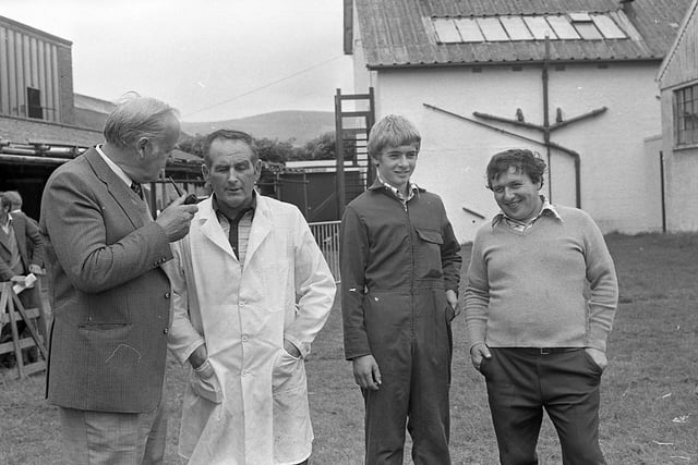 Making a point to Mr Robert Hanna, Knockahollet, Ballymena, during the judging of Suffolk sheep at the breed show and sale at Balmoral in August 1982. Picture: Farming Life/News Letter archives