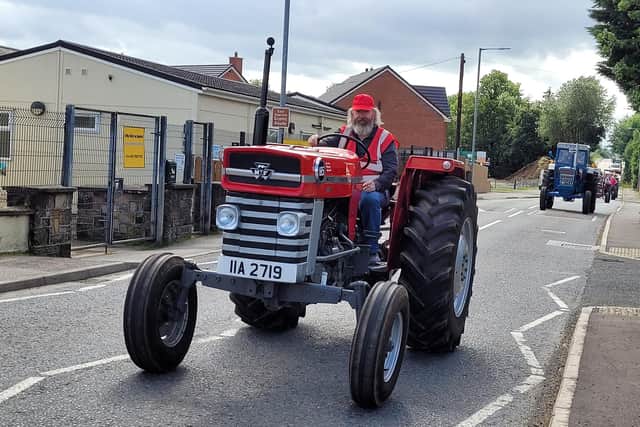 Tractors passing Straw chapel during the Bradley's Corner vintage tractor run. Picture: Darryl Armitage