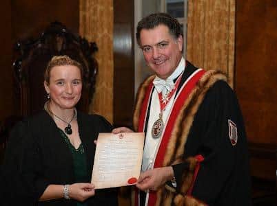 Jayne with Master Woolman Vincent Keaveny CBE who presented the certificate to certify her membership to the livery.