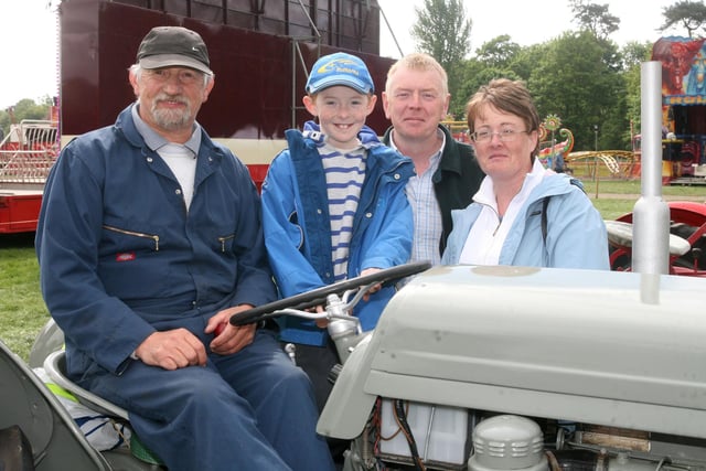 Robin Simms, with Christopher, William and Anne Hall at the Steam Rally held in Shane's Castle
