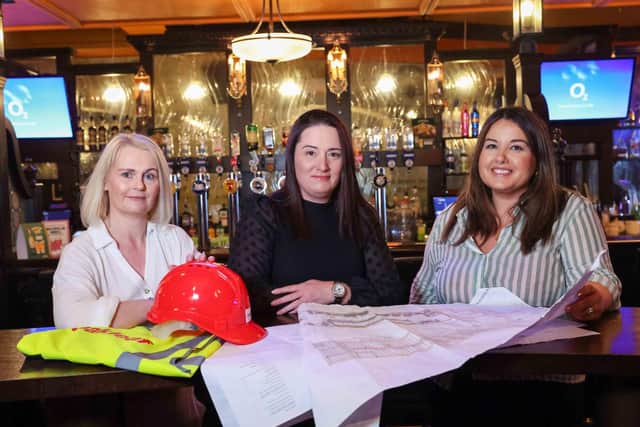 TIME Bar & Venue in Cookstown is to undergo a major summer refurbishment as part of an overall investment by the Magherafelt-based Oakleaf Group of £3 MILLION in the Mid-Ulster region over a two-year period.  Whilst the associated Jailbird Garden Bar will remain open and untouched during the construction works, TIME’s ground floor and first floor venue will be closed from Sunday June 30 and transformed into a traditional Irish sports pub, with new state-of-the-art multi-purpose first and second floor venue, both to be launched in the autumn. Reviewing the plans are (l-r) Paula McGeagh front of house manager, TIME Bar  & Venue, Nicky Huddleston, director of 1 OAK Leisure, and Nicolette Campbell, quantity surveyor, Oakleaf Contracts.