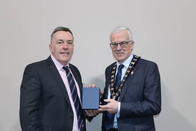 George Mullan, Managing Director of ABP Northern Ireland congratulates Mr John Henning OBE on his election as President of the RUAS. (Pic: ABP)