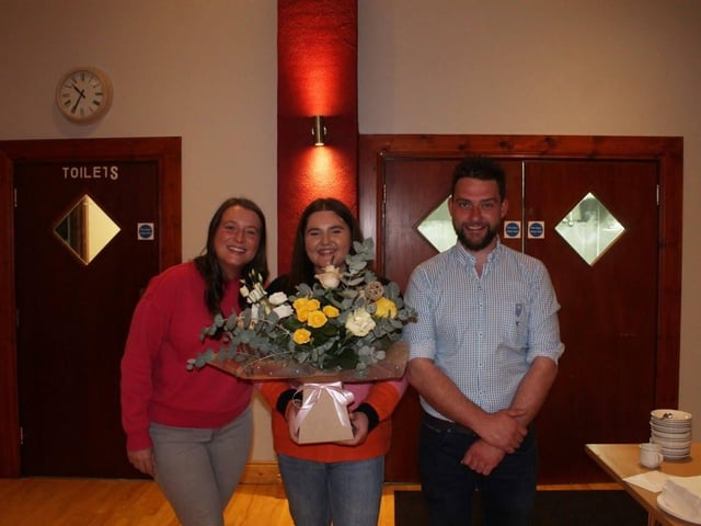 Club secretary, Joanna Caughey presenting a gift of thanks to outgoing club leader Alan Russell and Hayley-Rae Hopkins