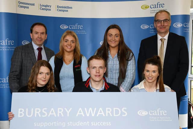 BSc (Hons) Agricultural Technology Bursary recipients. Back row (L-R) Dr Mark Carson, Higher Education Programme Manager, Rebekah Woodside, Rachel Kinnear and Mr Martin McKendry, CAFRE Director. Front row (L-R) Rachel Thompson, James Campbell, and Emma Turner.